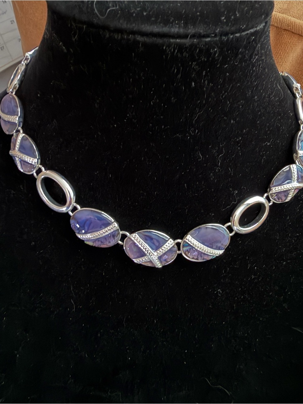 Purple enamel and silver tone necklace